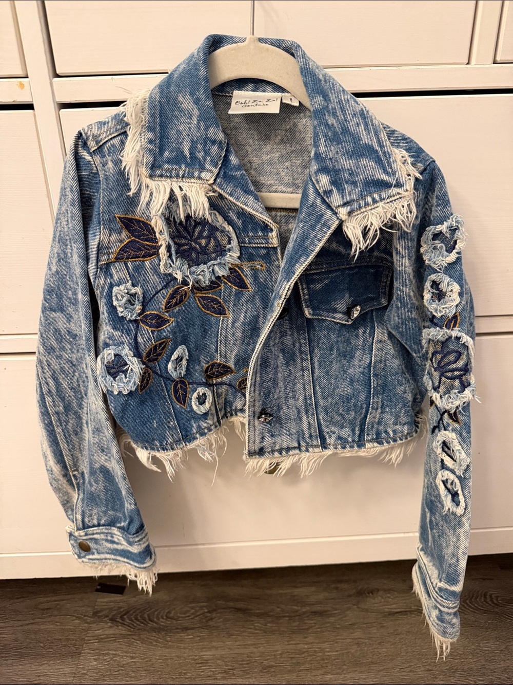 CeliaB Light Blue Distressed Cropped Denim Jacket with Floral Embroidery